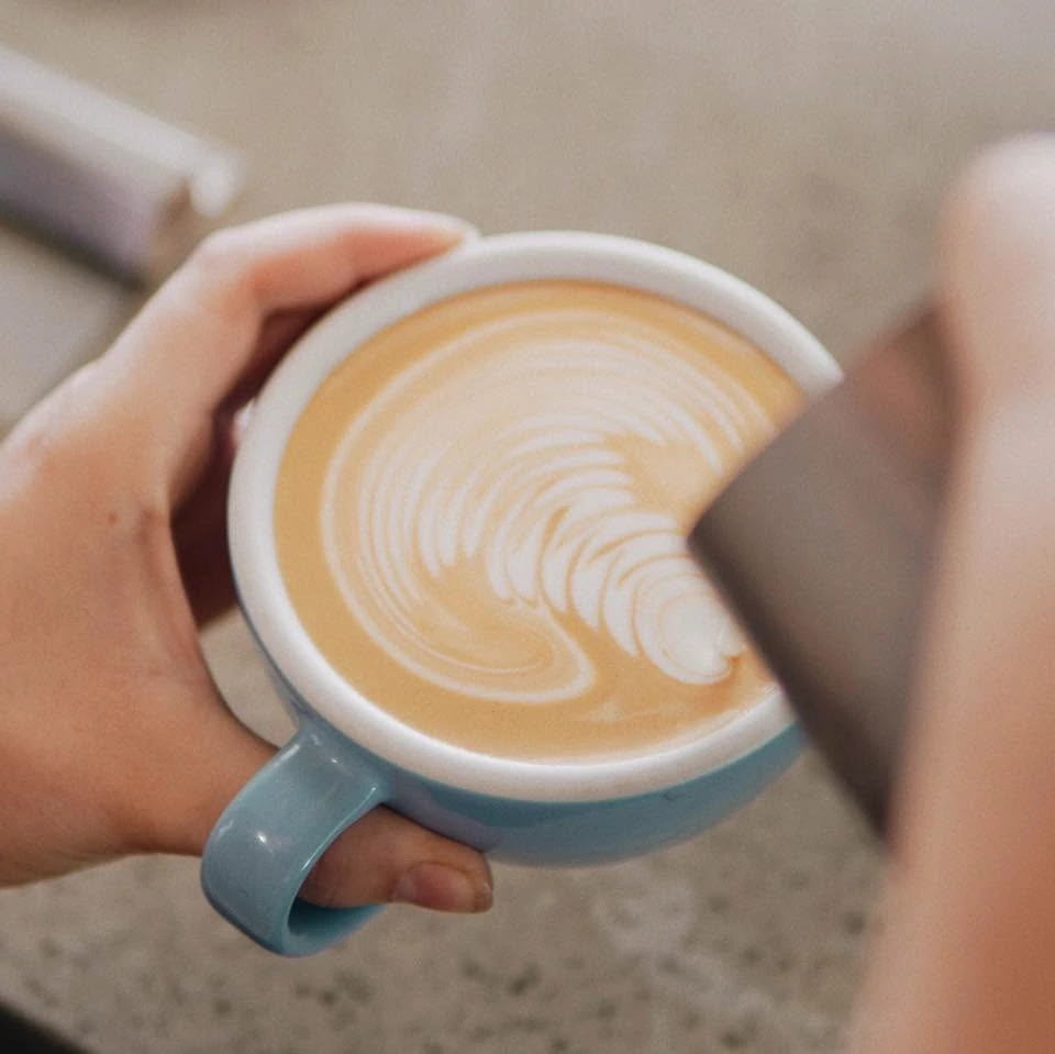 Coffee with latte art at Lotus Cafe